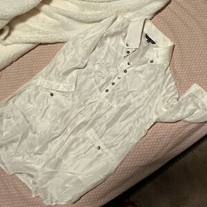 100% silk top. Soft and flowy